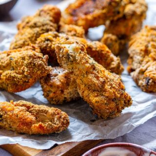 Homemade breaded crispy chicken wings with a dip