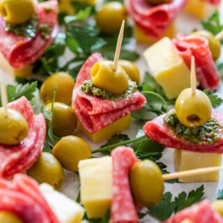 Salami and cheese skewers with olives