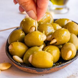 Eating almond stuffed olives