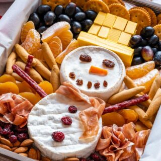 Snowman cheese board for winter gatherings