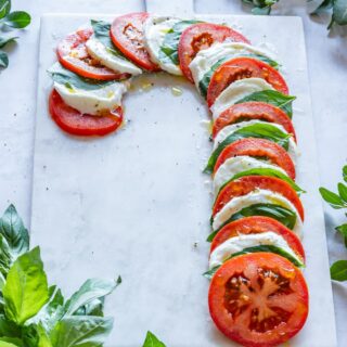 Tomato, basil and mozzarella appetizer - candy cane Caprese board.