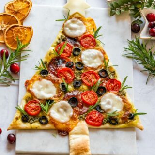 Festive Christmas tree shaped pizza.