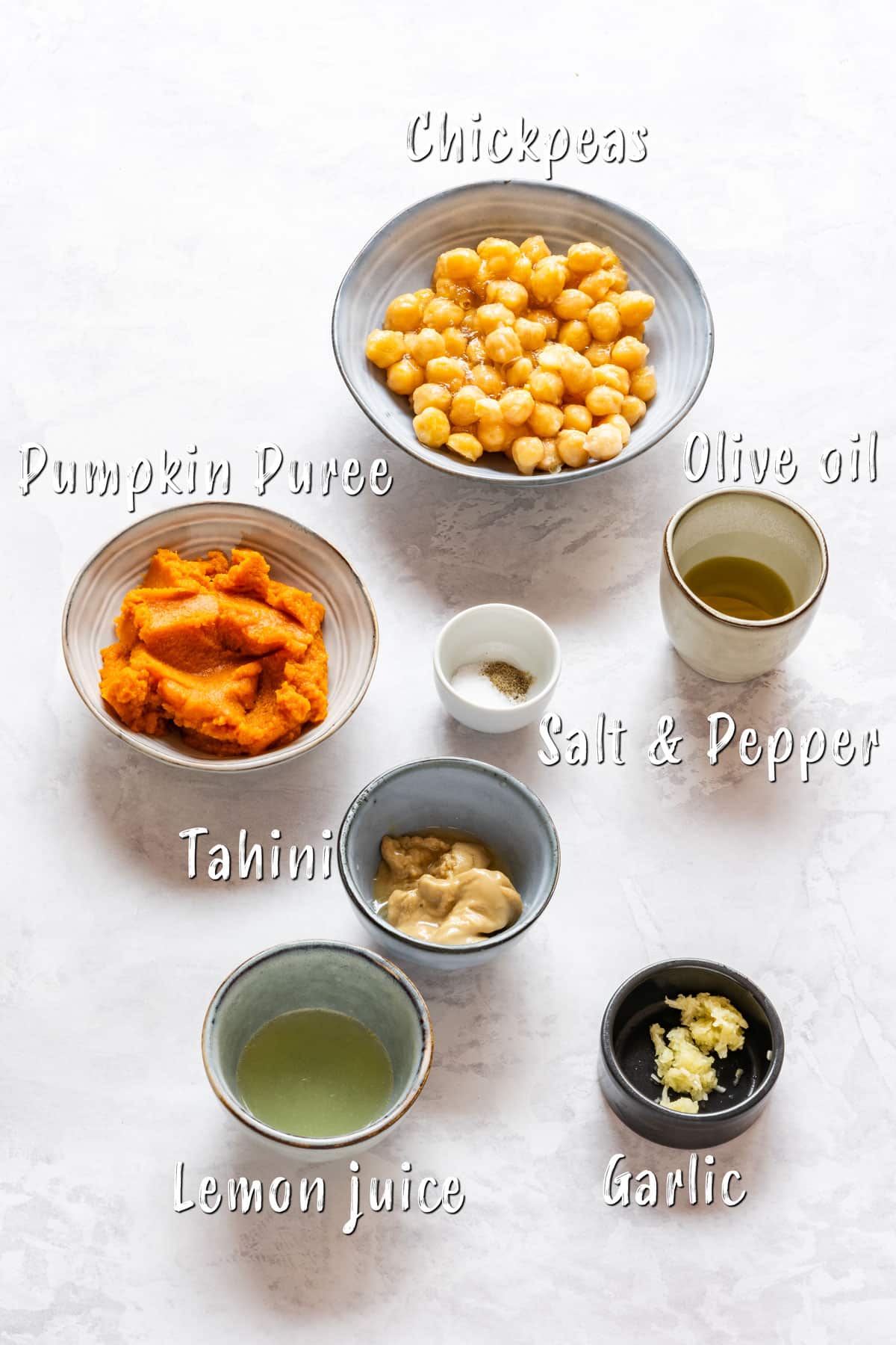 Ingredients of pumpkin hummus on the table.